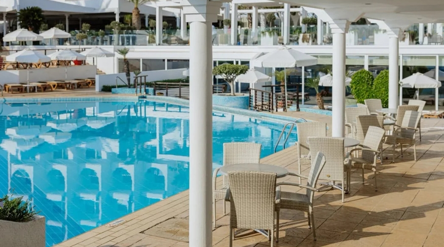 The Golden Coast Beach Hotel — seatingOutdoor